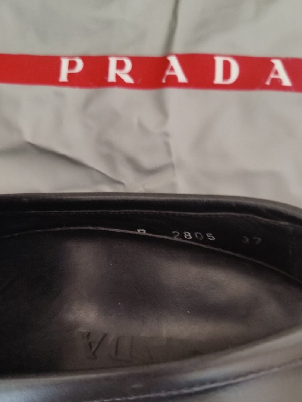 Authentic Prada Black Leather Penny Loafers For Women - Picture 2 of 10